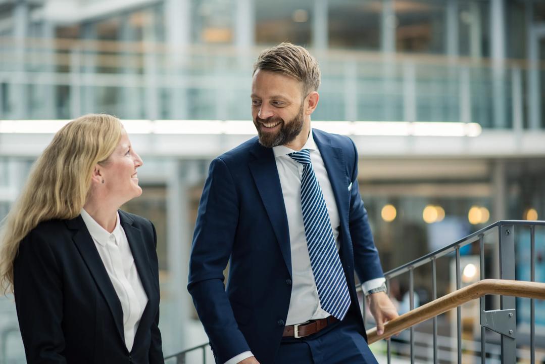 Two colleagues talking