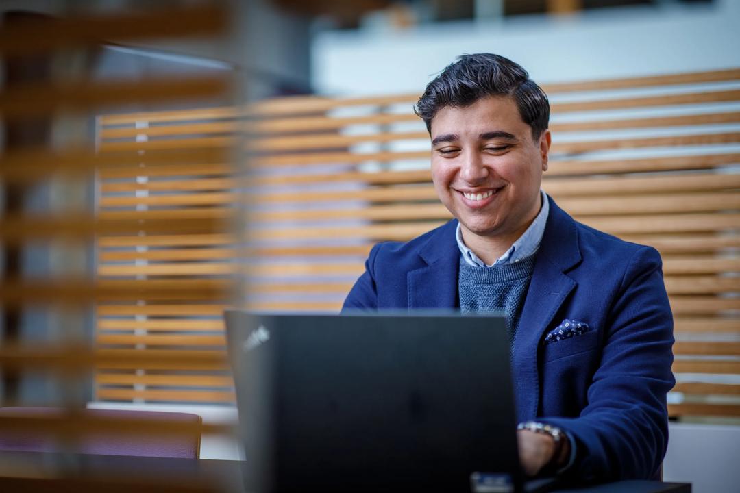 Image of a man attending a digital meeting