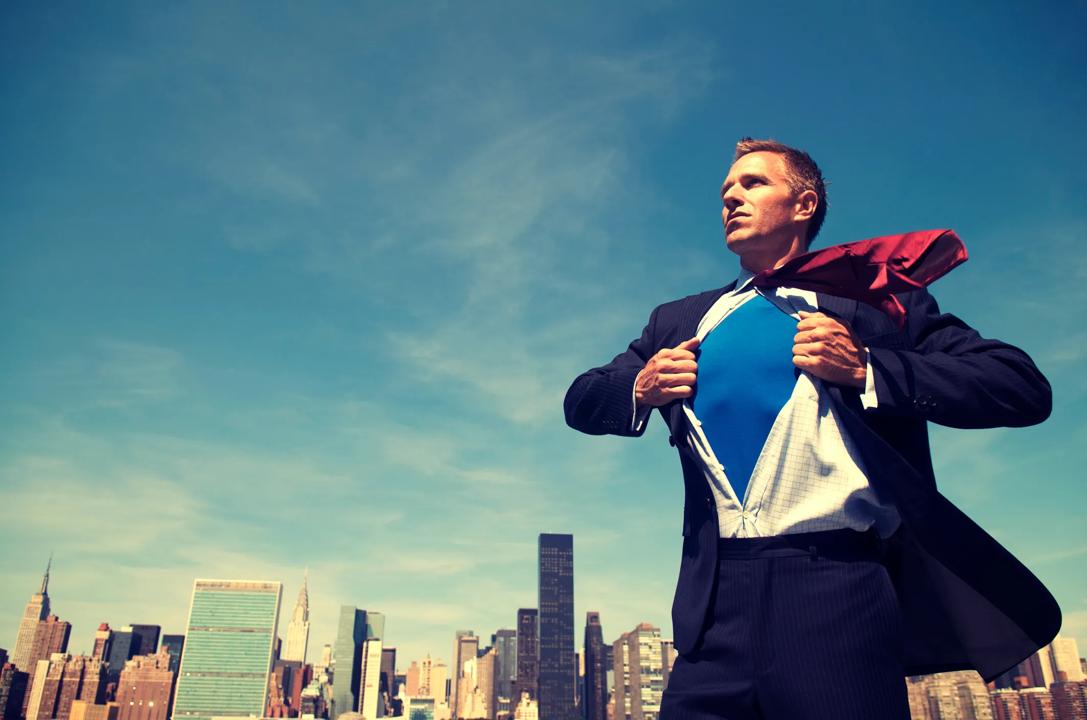 Business leader in super hero pose