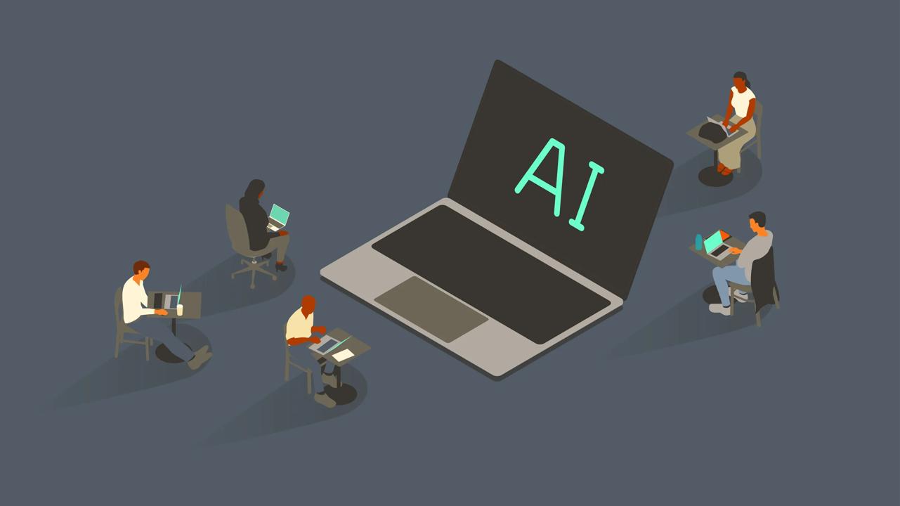 Five people surround an oversized laptop with the letters AI on-screen.