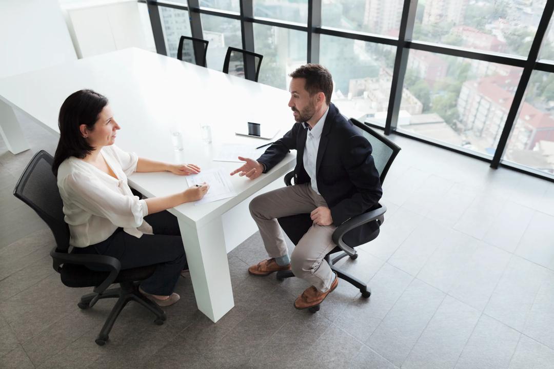 A man and a woman talking
