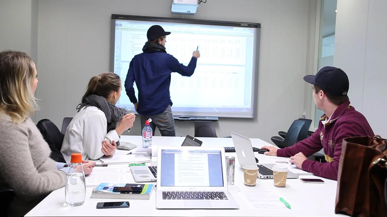 Students working on whiteboard