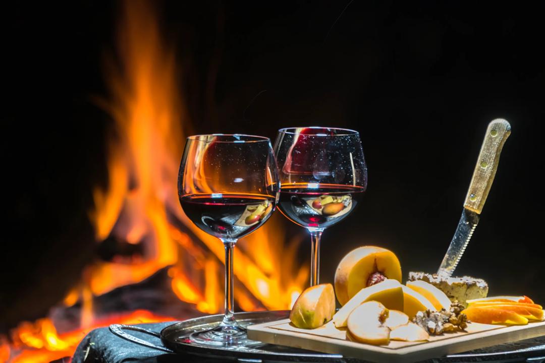 Food and drinks in front of fireplace