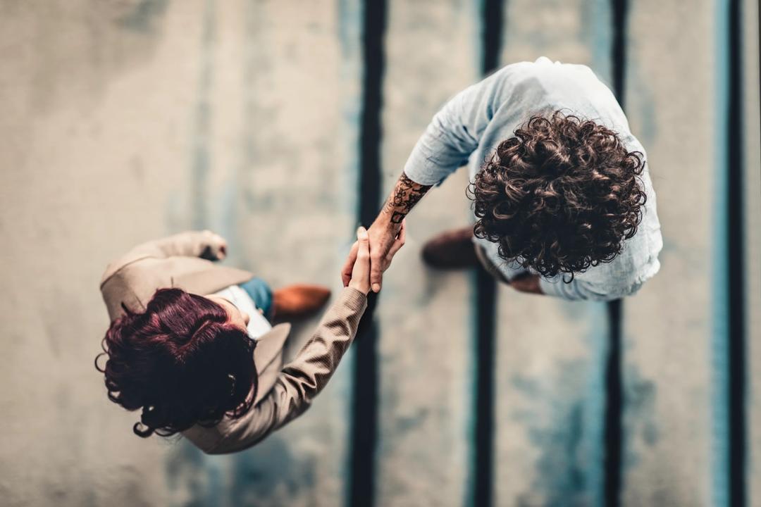 Two people shaking hands