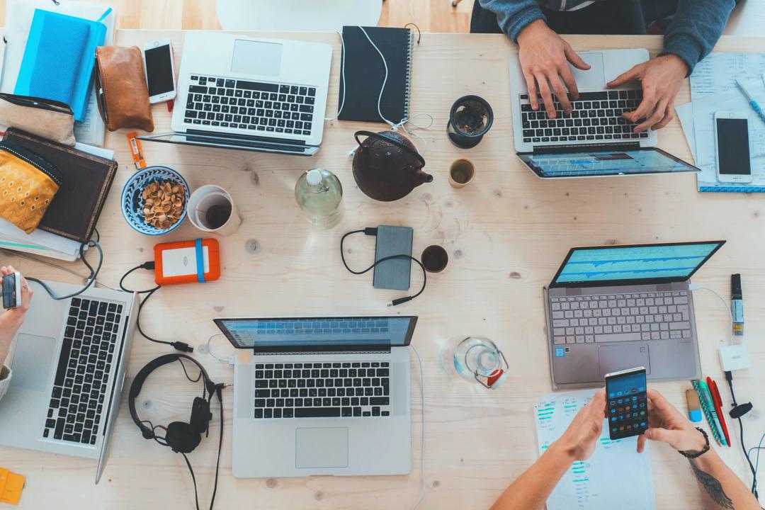 People sitting down with computers