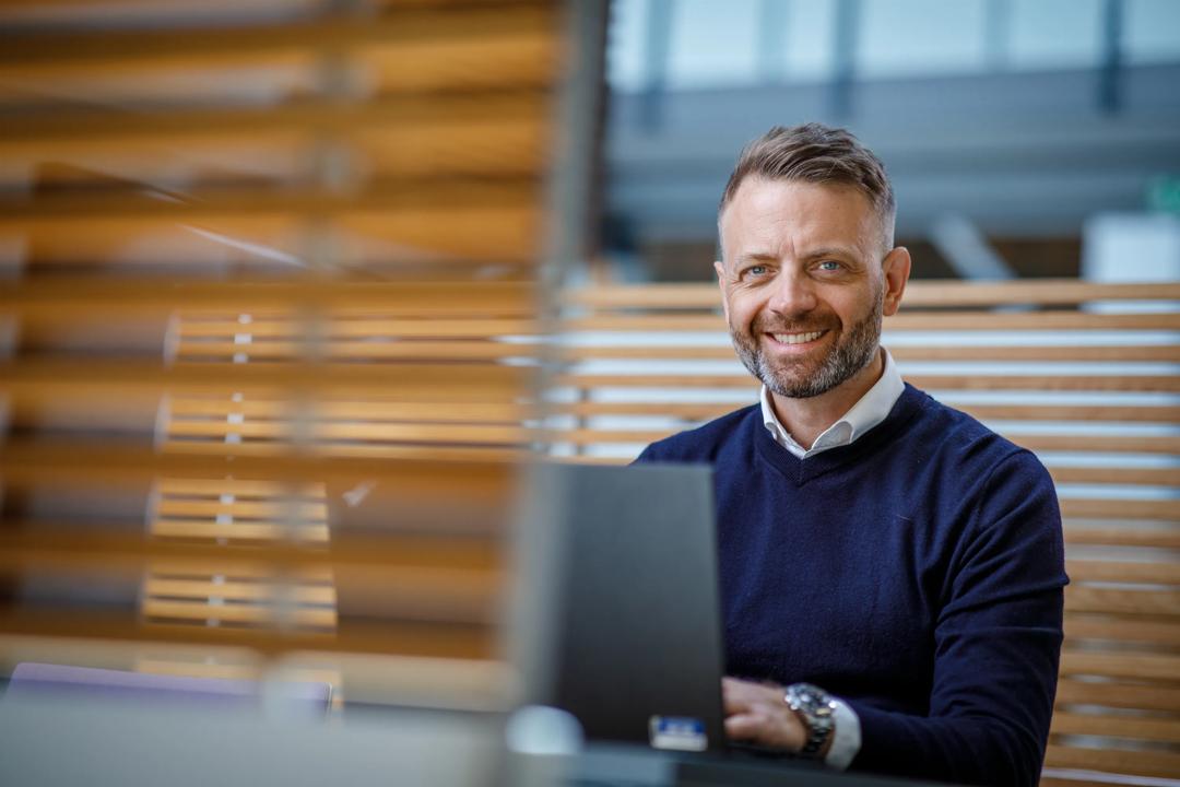 Image of an man working on his pc