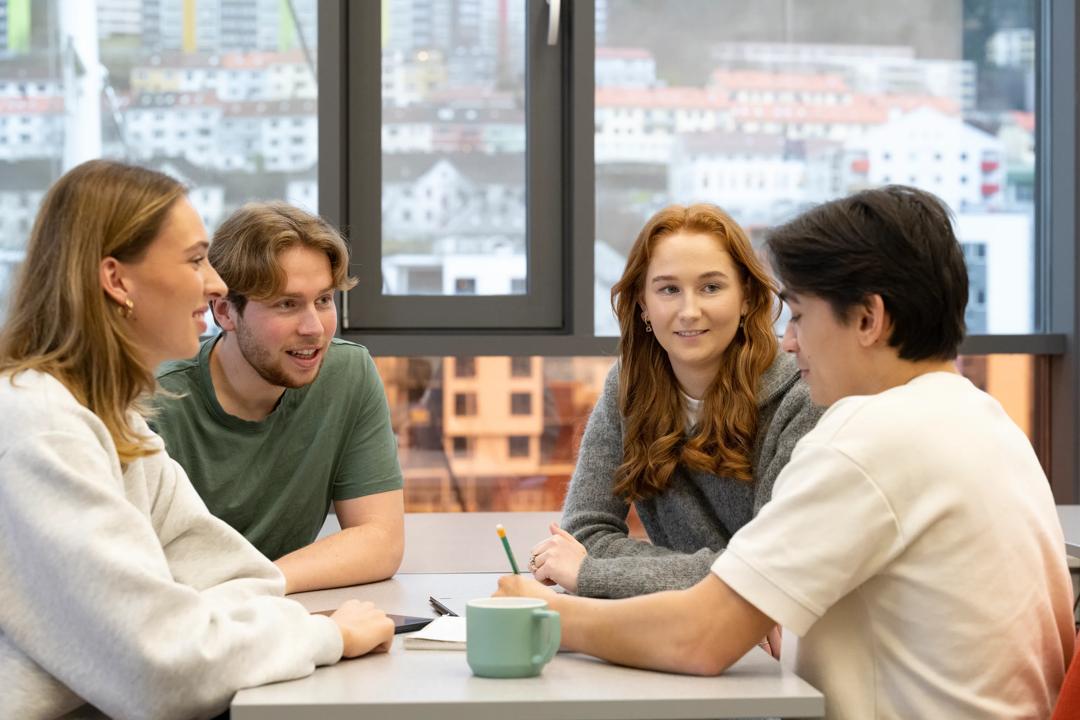four students working together