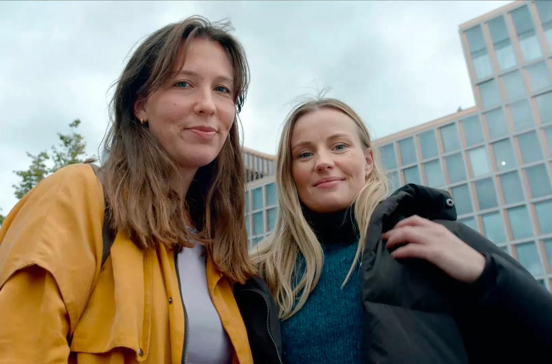 Two women smiling 