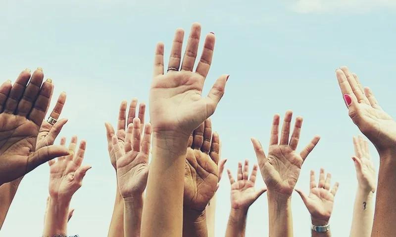 People raising hands