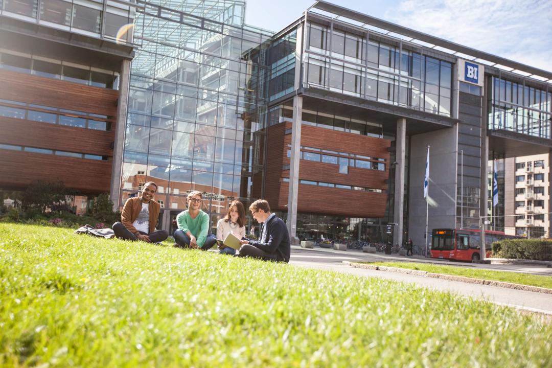 Students on the grass at Campus Oslo