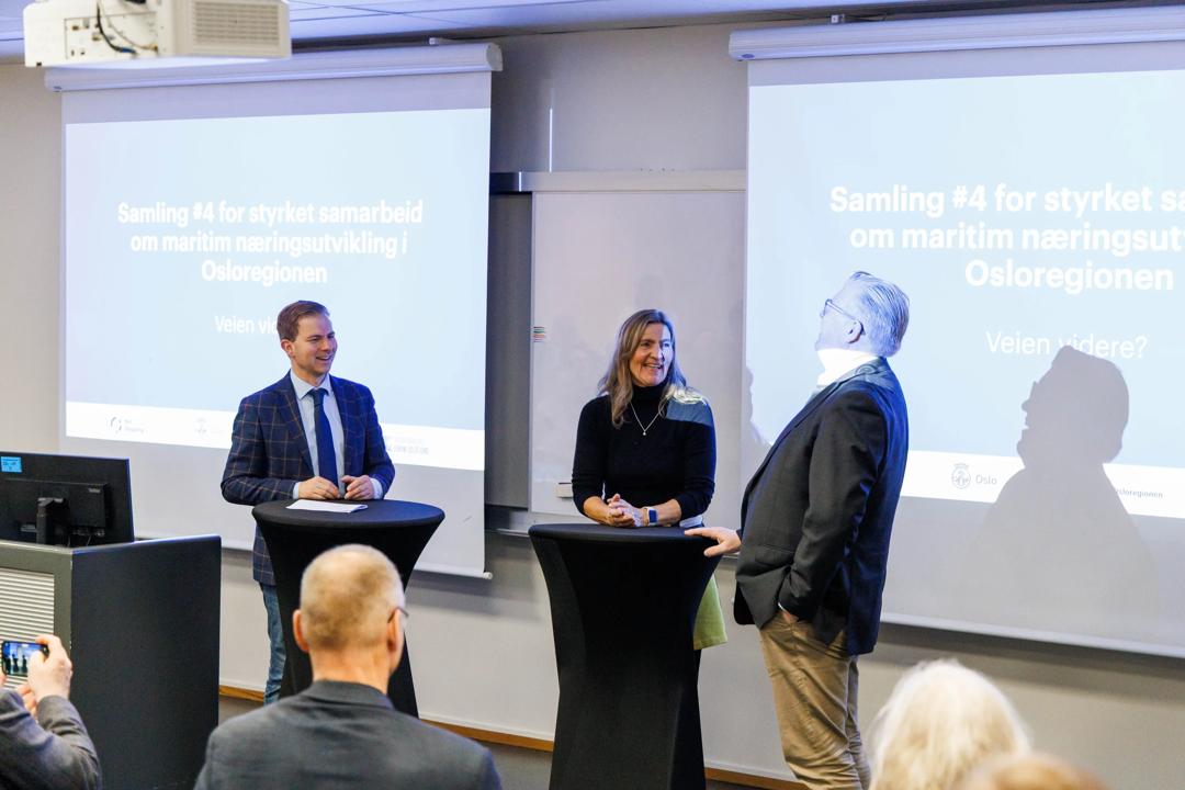 Three of the speakers during the event presenting. Photographed by Adrian Vaagsnes, BI Norwegian Business School.